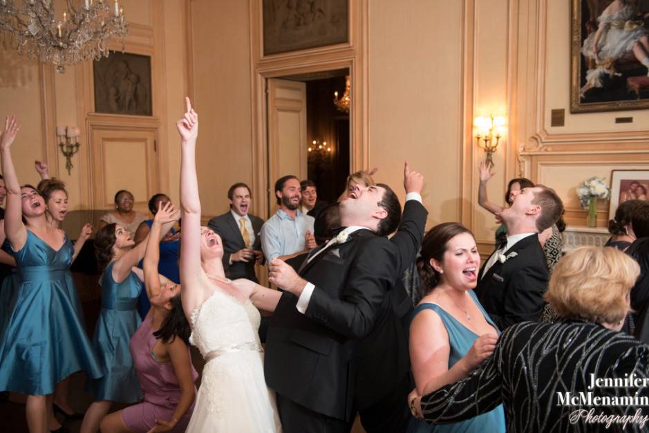 The couple with their guests dancing