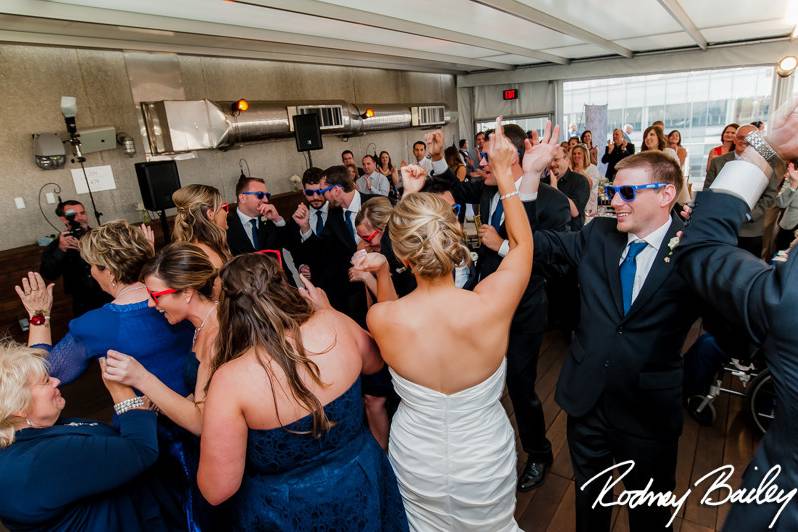 The couple with their guests dancing