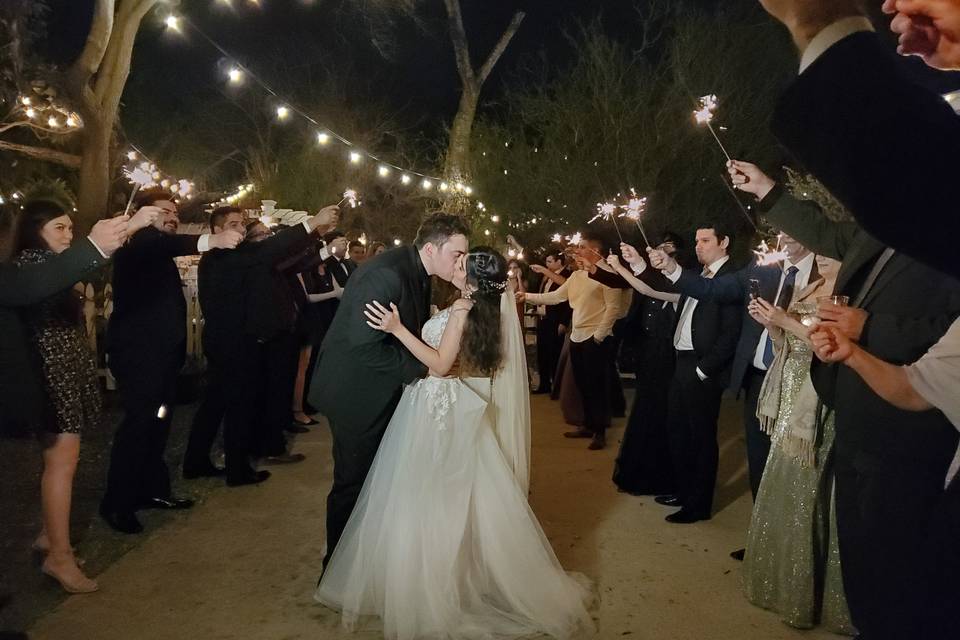 Couple exits with sparklers