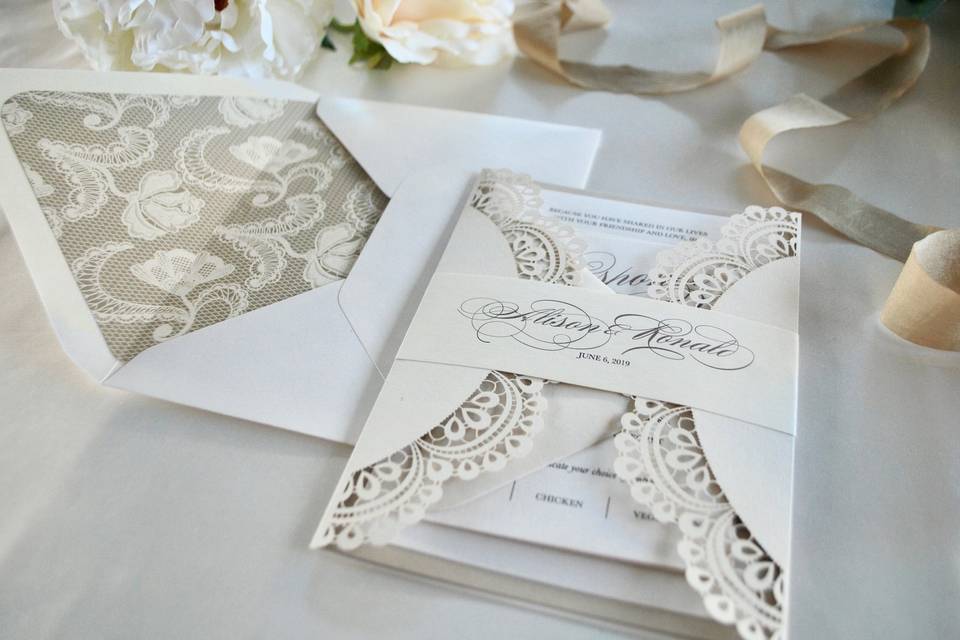 Ivory laser cut wedding invite