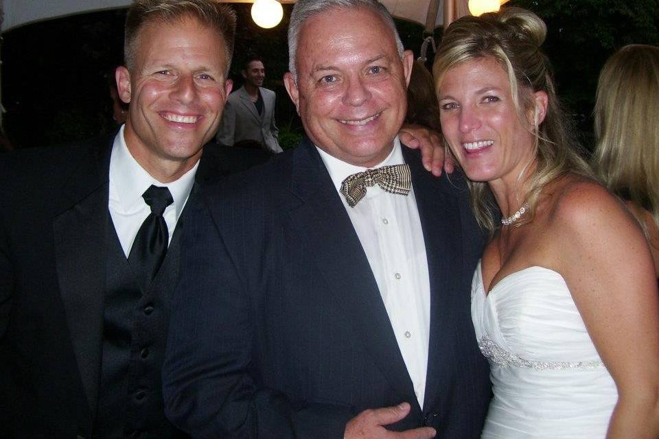 Husband and wife with the officiant