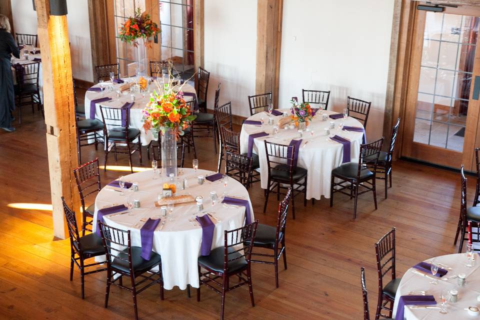 Reception set-up with high and low centerpieces