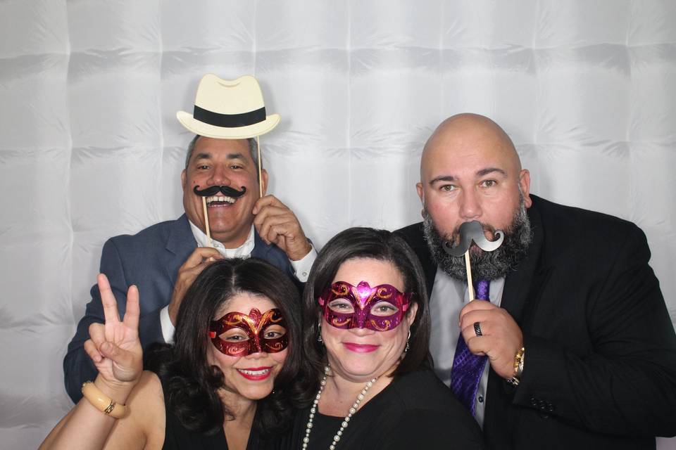 Groomsmen enjoying the photo booth