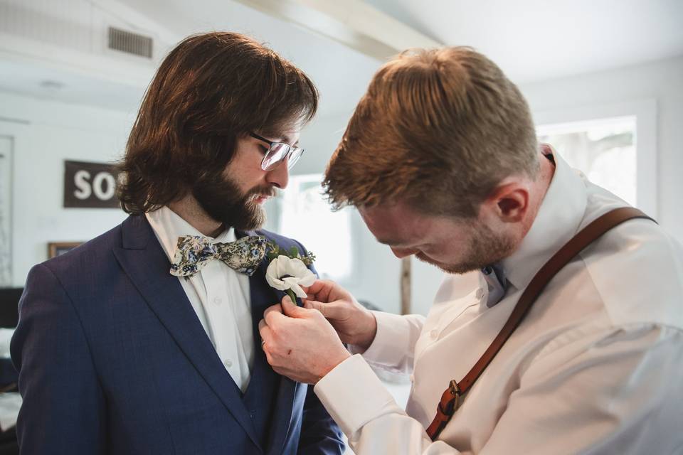 Helping with the boutonniere