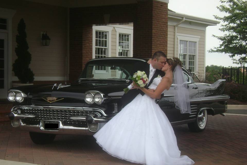 A class dip, stroll, and ride on this August wedding day in the 1958 Cadillac