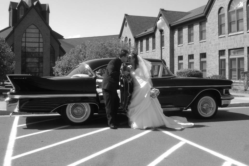 Elegance...a walk down the aisle and into the back seat of a 1958 Cadillac.