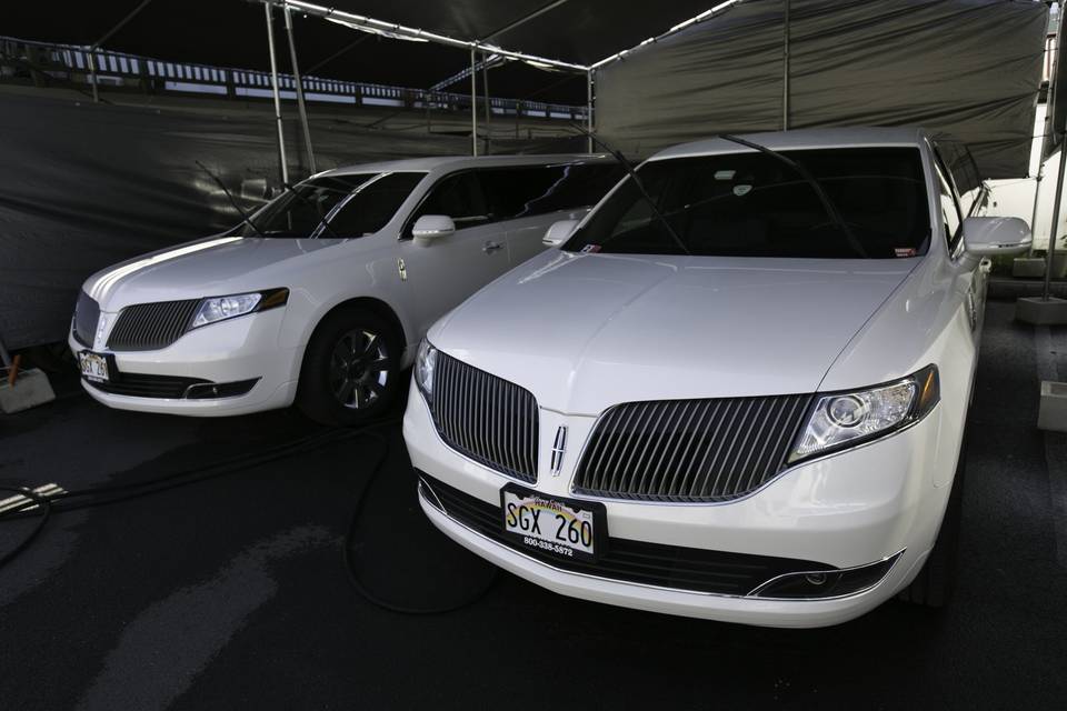 Two Lincoln MKT limos