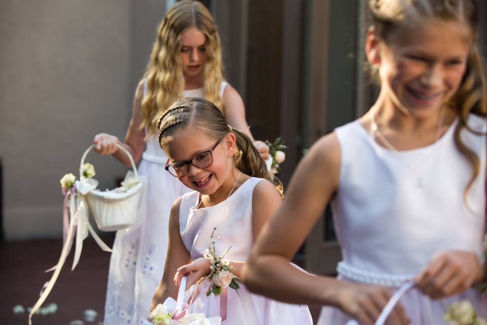 Flower girls make an entrance.