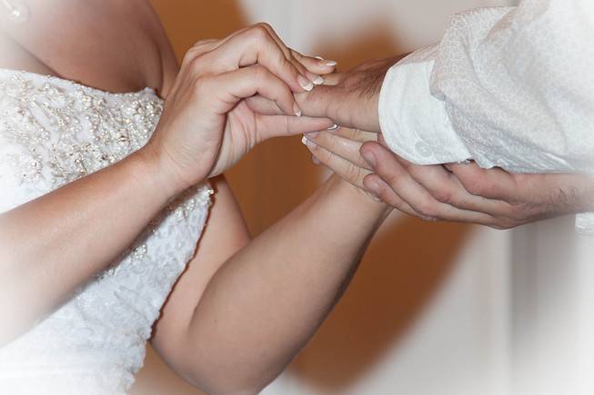 Couple exchanging ring