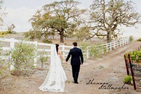 Couple walking down a road