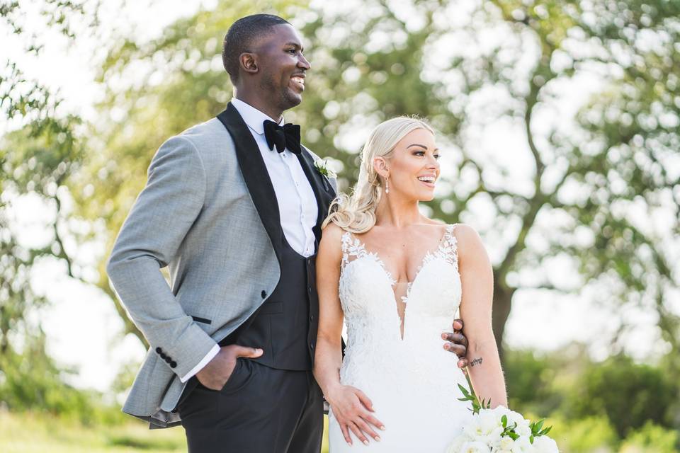 Smiling bride and groom