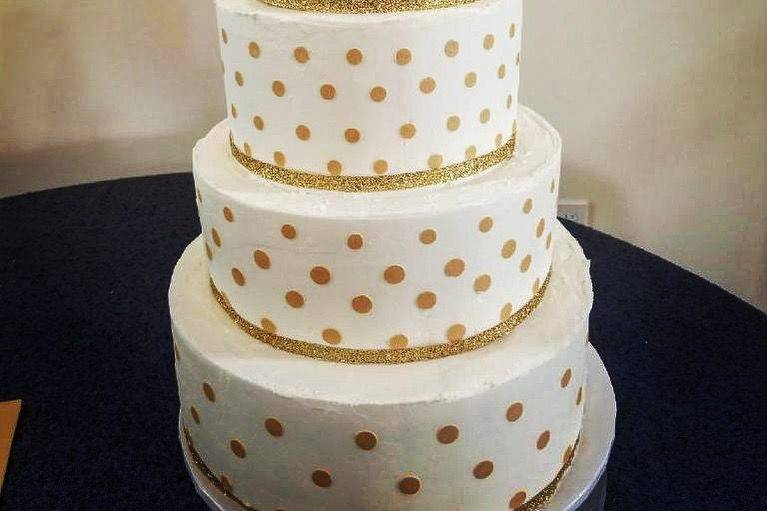 White and gold wedding cake