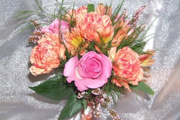 Lovely roses,alstrameria,heather and carnations.