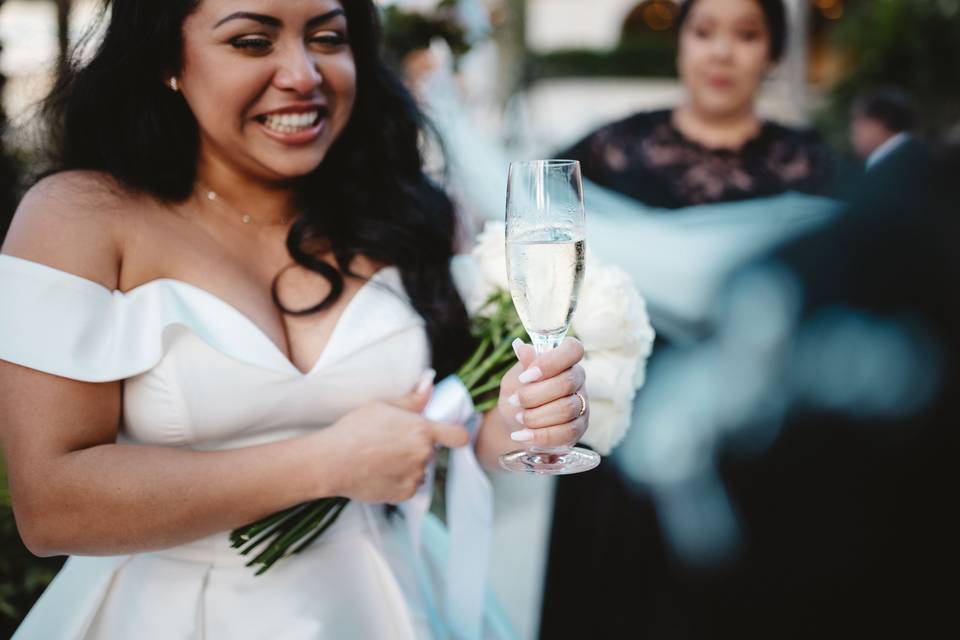Guest-of-honor holding a glass