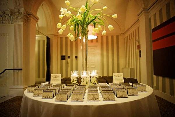 Cards all lined up for guests at Anna & Todd's wedding at the Hotel Monaco in Washington, DC