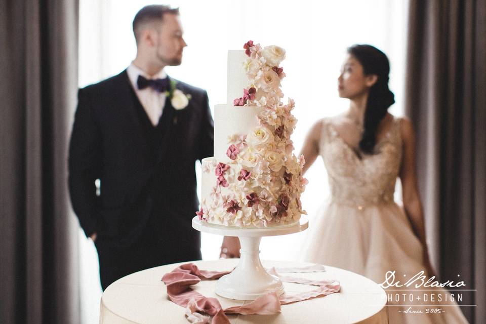 Bride, groom, cake
