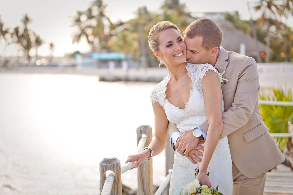 Groom kisses