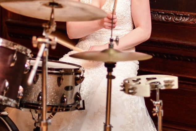 Bride sitting in on drums
