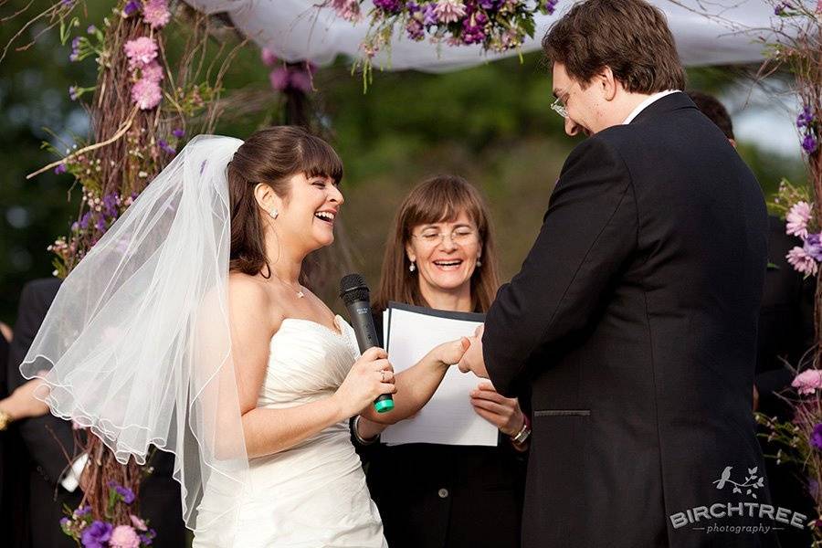 Officiant Dr. Barbara Schwarck with Abby and Matthew Bolton