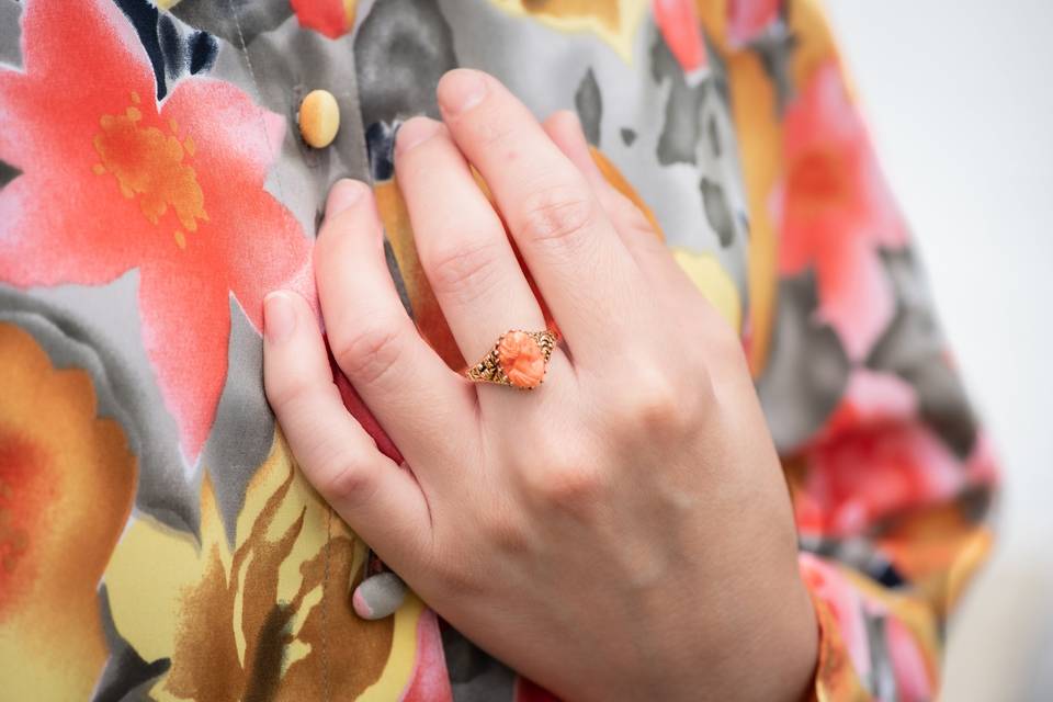 Carved coral cameo ring