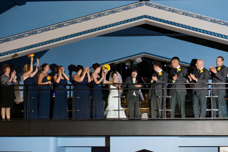 The couple together with their bridesmaids and groomsmen