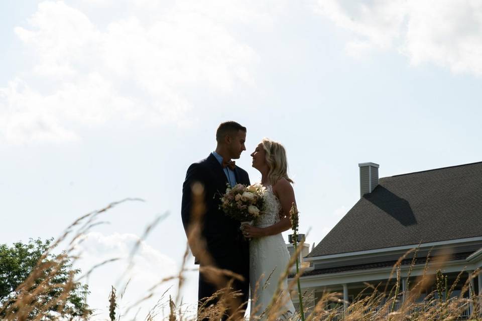 Bride and Groom grass