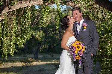 Bride kissing her groom