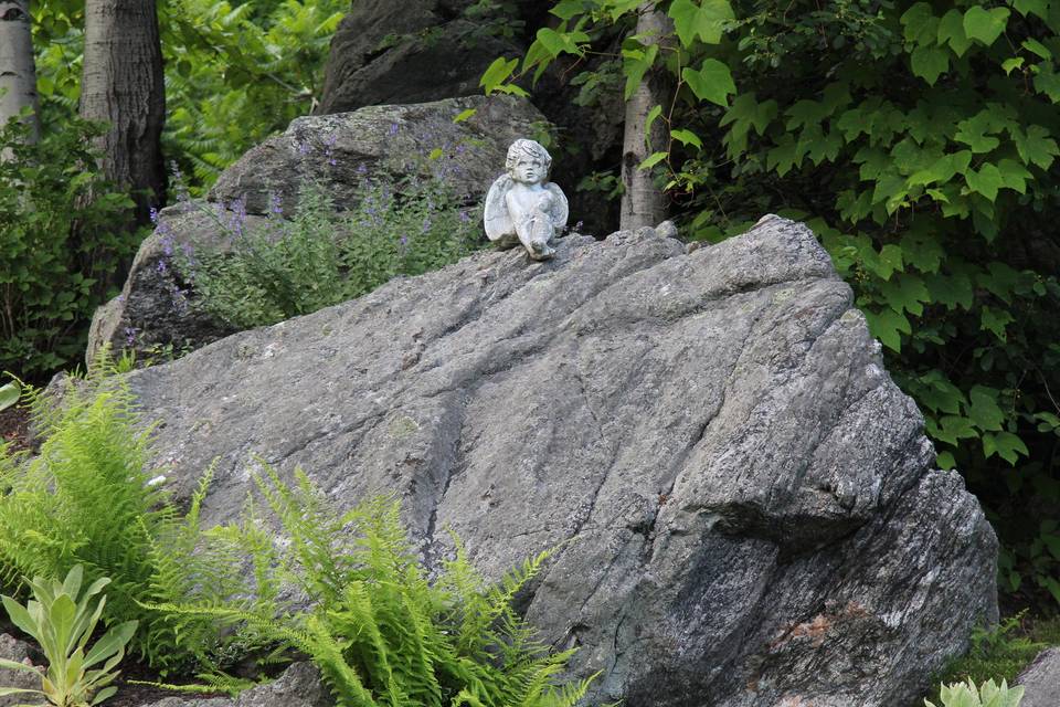 Large Rock on Hill Over Looking Water Fall