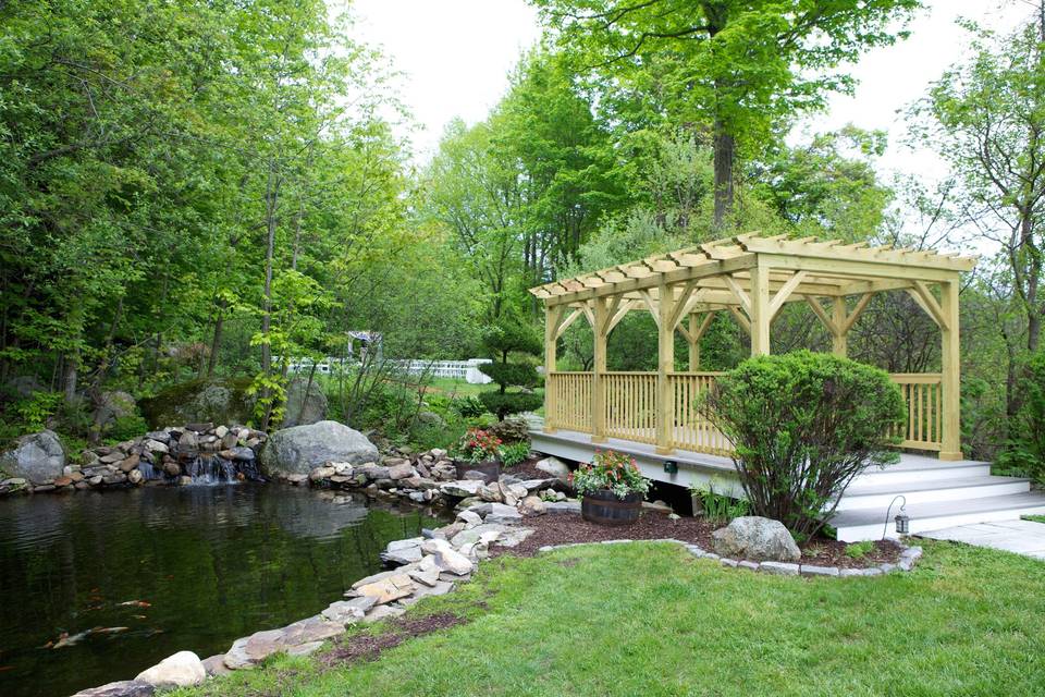 Koi Pond and Bridge Over Stream to Ceremony Area