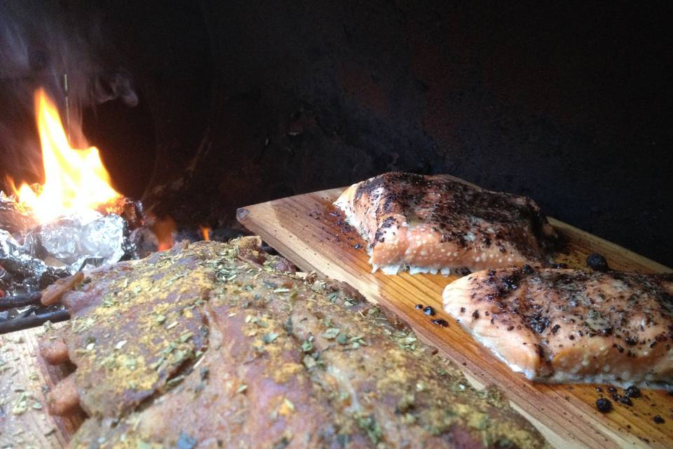 We do our own Smoked Salmon and Ribs the traditional way, in the woods using local wood and a homemade barrel smoker