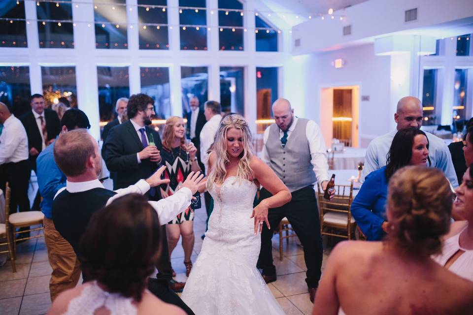 Bride dancing with her guests