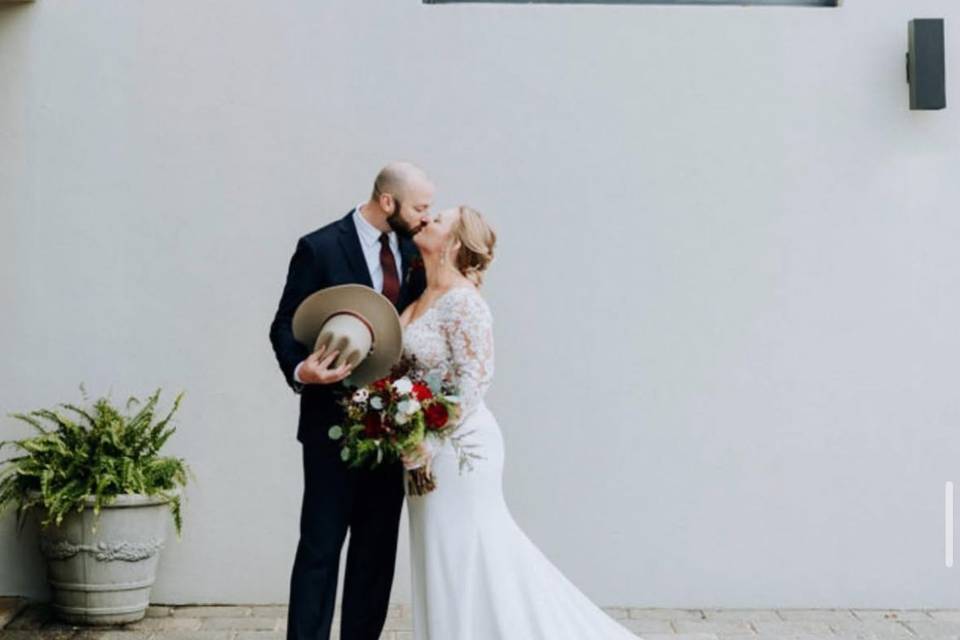 Couple at concrete wall