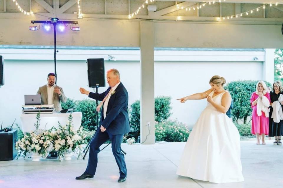 Bride and father dancing