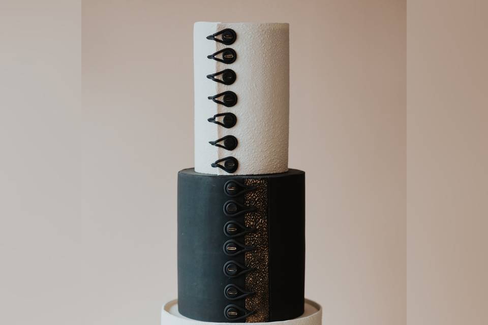 Black and white button cake