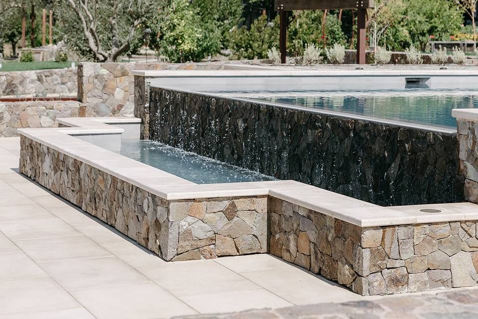 Fire pits below the pool