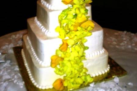 cake with yellow callas