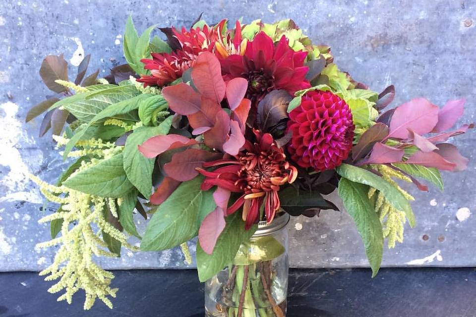 a dahlia and greens wedding bouquet for a romantic dawn elopement.