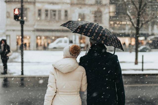 Couple walking in the snow