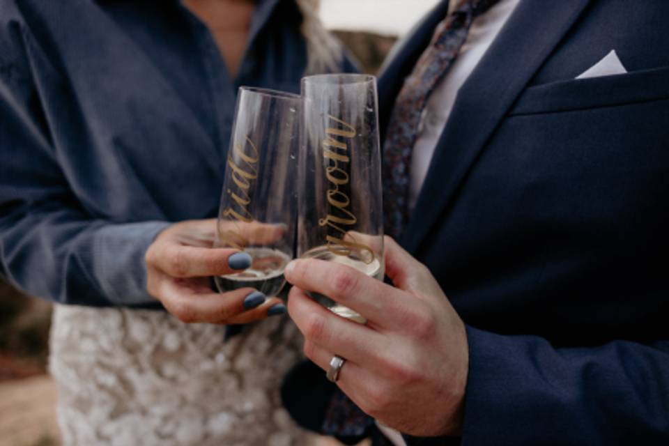 Bride and groom wedding glasse