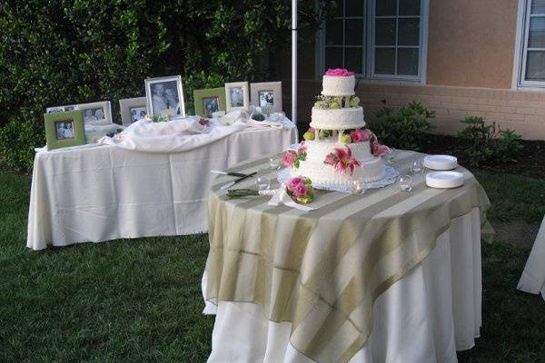 A beautiful cake table in front of our Tuscan style winery.