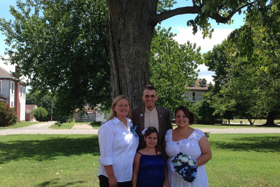With the wedding officiant