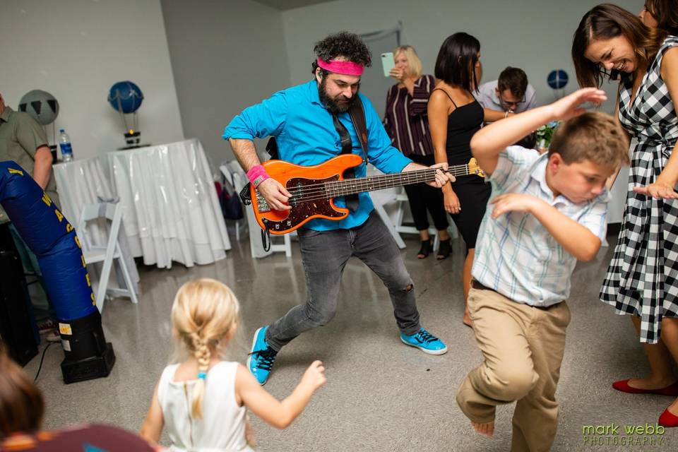 Guitarist entertaining kids
