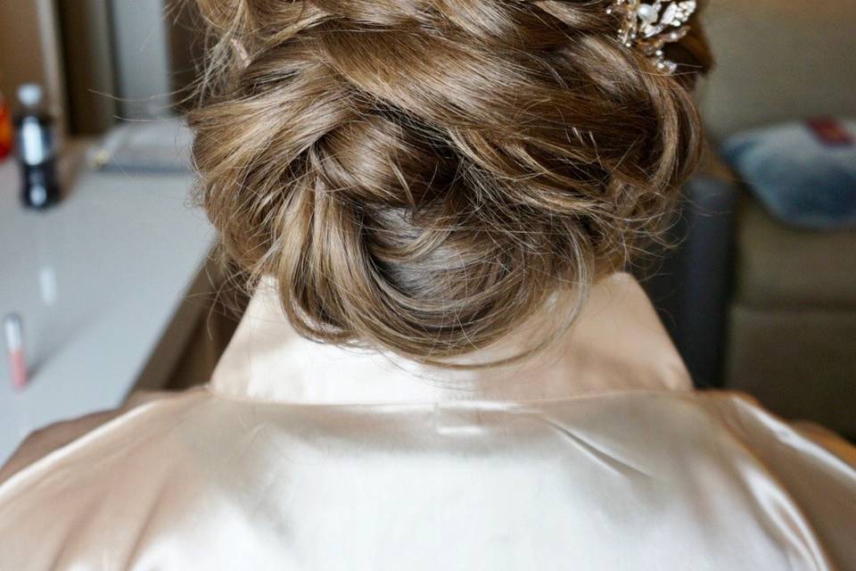 Low bun with side braid