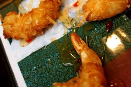 Fried coconut crusted jumbo shrimp with an exotic fruit glaze