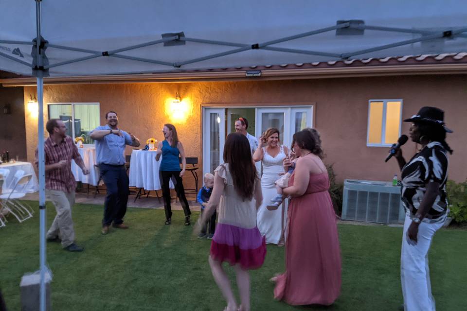 Happy guests dancing