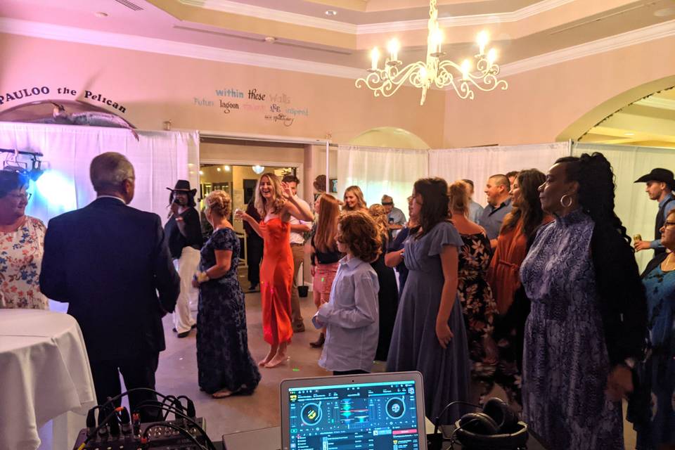 Happy guests dancing