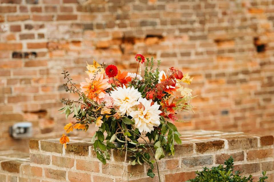 Brick background and flowers