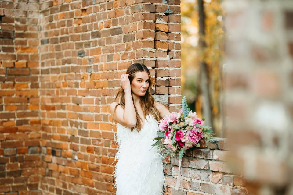 Bride by window in the ruins