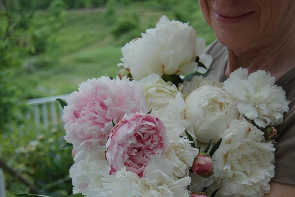 Dahlias and roses with seeded euc and greens