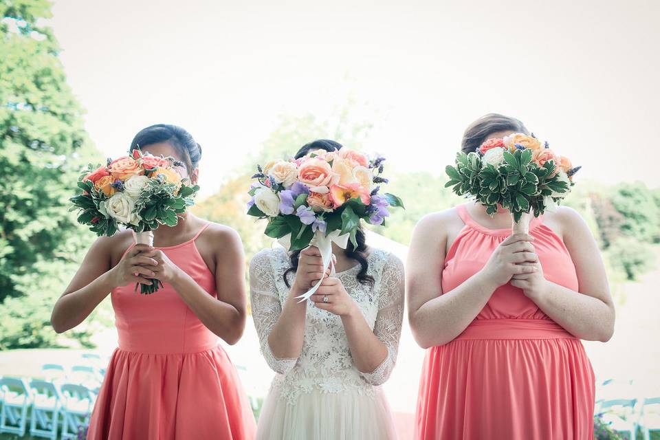 Coral peonies with sweet peas